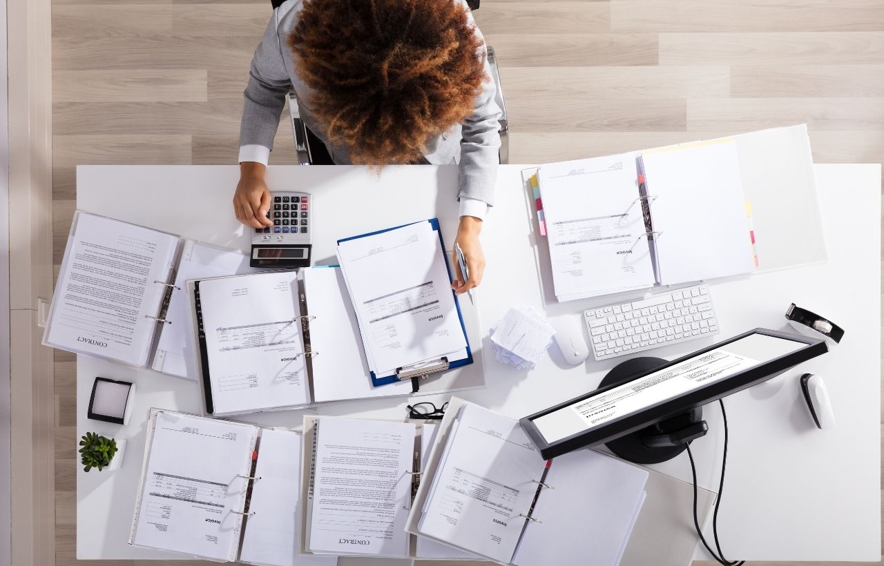 Accountant at desk with documents